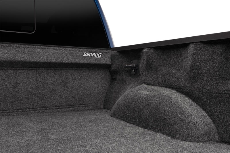Nissan truck bed enhanced with a gray BedRug carpet liner