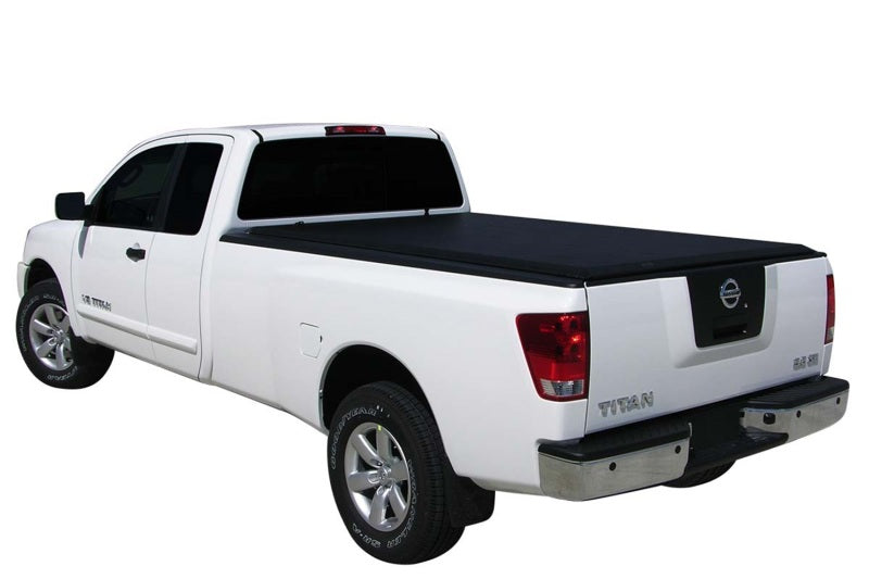 Side profile of a white pickup truck fitted with the Access Original black tonneau cover