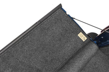 Load image into Gallery viewer, Close-up view of the BedRug textured surface showing the tailgate