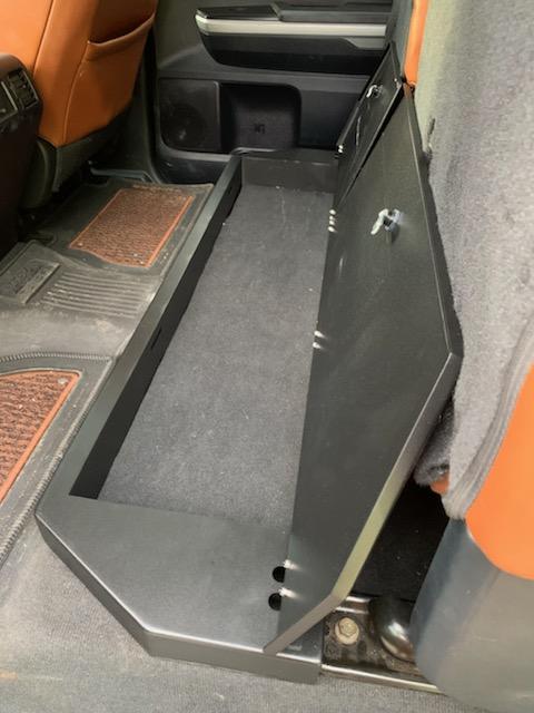 Toyota Tundra CrewMax featuring a built-in storage unit under the rear seat for extra security