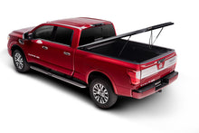 Load image into Gallery viewer, UnderCover Nissan Titan 6.5ft SE Bed Cover - Black Textured