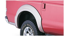 Load image into Gallery viewer, Black fender flares designed for a Ford Excursion by Bushwacker
