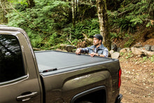 Load image into Gallery viewer, Roll-N-Lock GM Silverado / Sierra 2500/3500 6ft 10in Bed A-Series Retractable Tonneau Cover