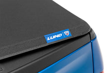 Load image into Gallery viewer, Lund Nissan Titan (5.5ft. Bed w/o Titan Box) Genesis Elite Tri-Fold Tonneau Cover - Black