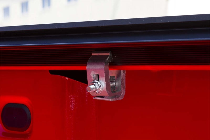 Detailed view of the metal latch on the Access Original roll-up cover for Ford F-150