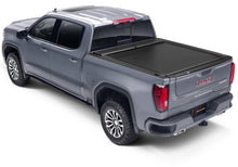 Load image into Gallery viewer, Roll-N-Lock Chevrolet Silverado 2500-3500 (82.2in. Bed) A-Series XT Retractable Tonneau Cover