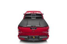 Load image into Gallery viewer, UnderCover Nissan Frontier 5ft Elite Bed Cover - Black Textured