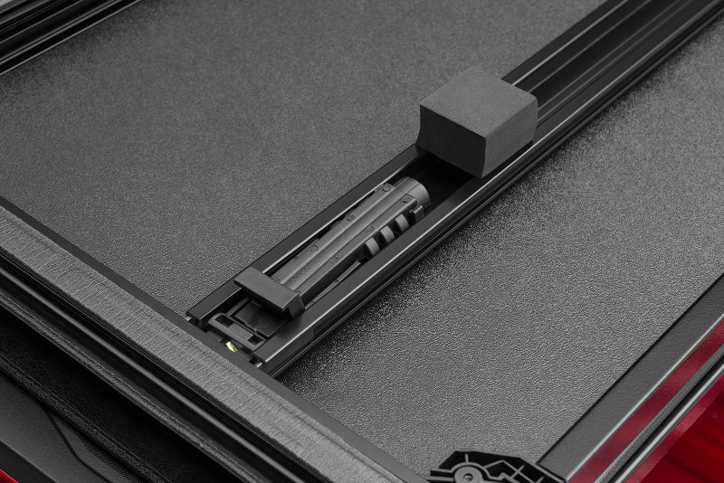 Lund Dodge Ram 1500 Fleetside (6.4ft. Bed) Hard Fold Tonneau Cover - Black