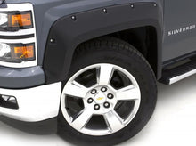Load image into Gallery viewer, Lund Dodge Ram 1500 RX-Rivet Style Smooth Elite Series Fender Flares - Black (4 Pc.)