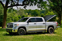 Load image into Gallery viewer, UnderCover Toyota Tundra 5.5ft SE Bed Cover - Black Textured
