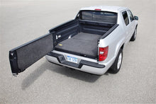 Load image into Gallery viewer, Open bed of Honda Ridgeline showcasing the BedRug mat&#39;s texture and fit