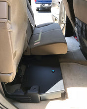 Load image into Gallery viewer, Toyota Tundra Double Cab with the under-seat storage unit installed, demonstrating the additional security feature